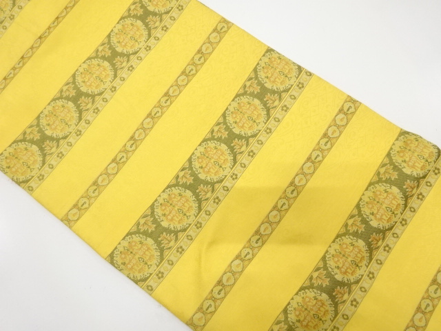 横段に動物更紗模様織り出し名古屋帯